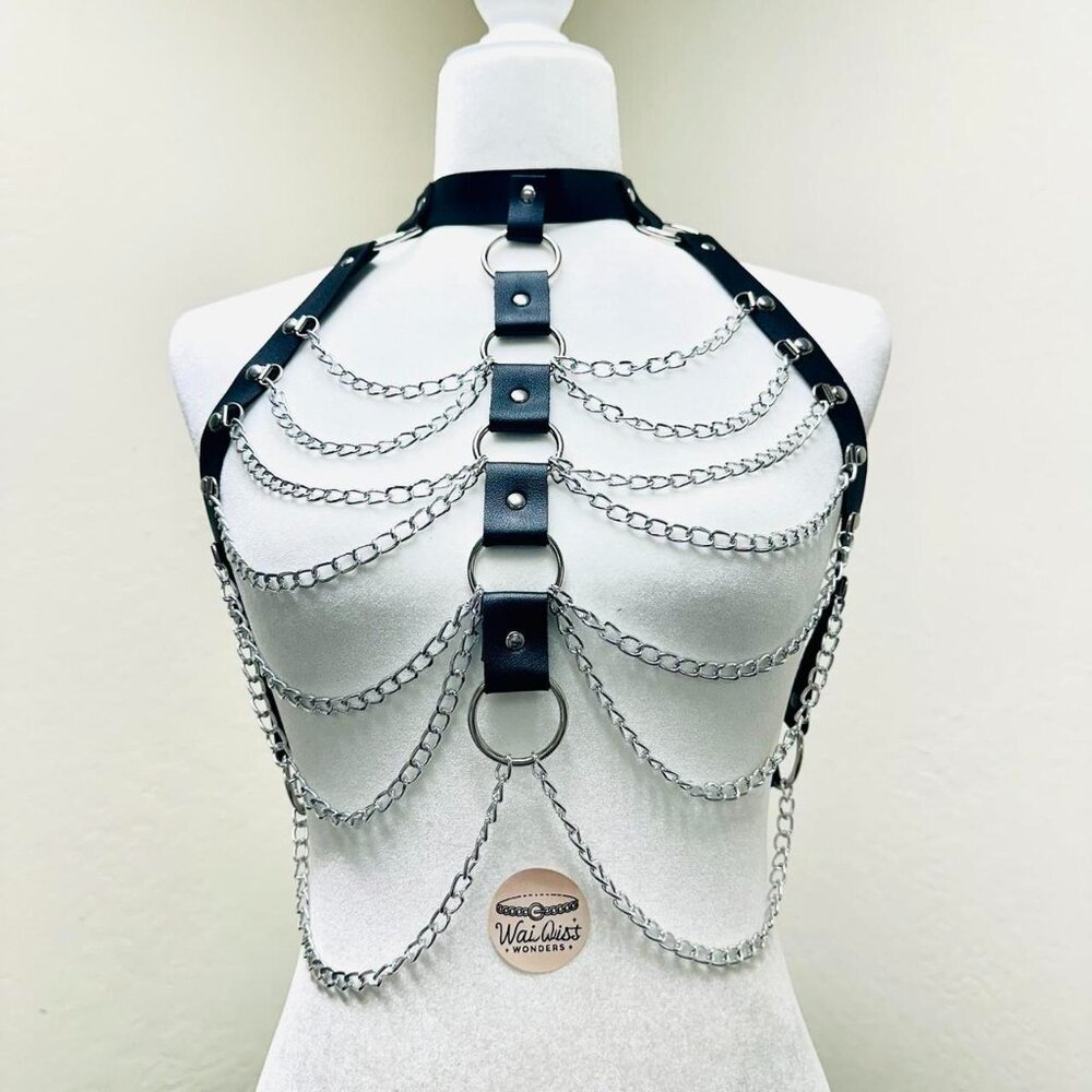 Black leather harness with silver chain details